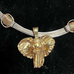 Beautiful 925 silver elephant (gold color) necklace.